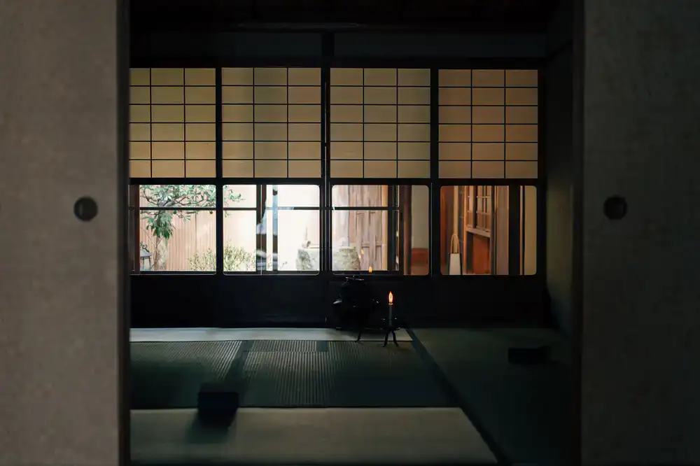 Sunlight streaming into the calm tea house interior