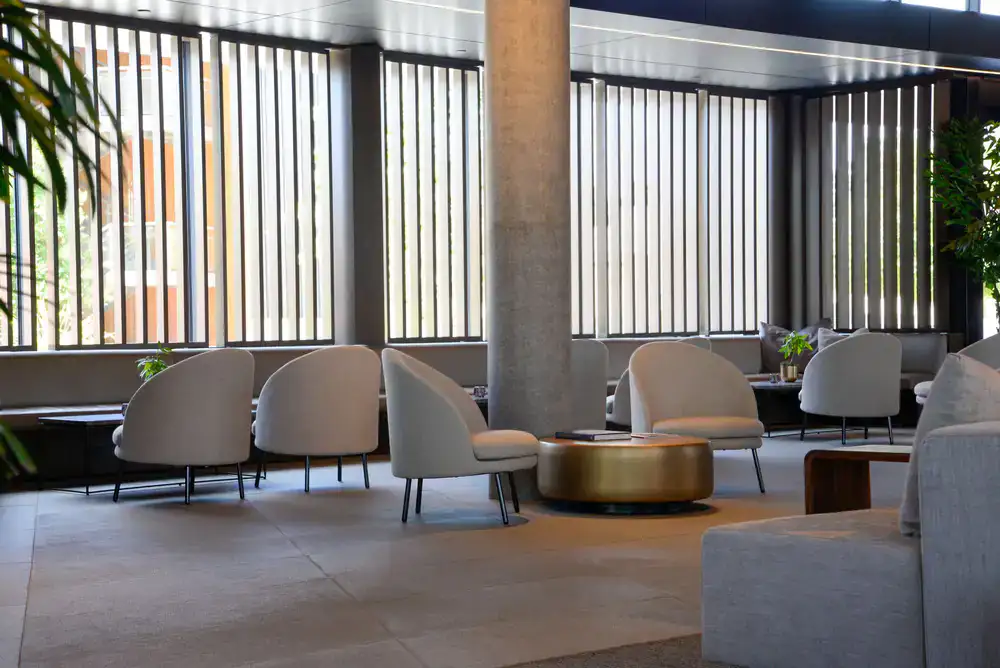 Guest relaxing in the sunlit seating area
